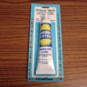 Tube of Unique Stitch Base Adhesive (used for adhering cloth and velour) - Image 1