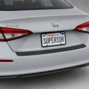 Black vinyl rear sill plate installed on the rear bumper loading edge of a 2023 Honda Civic.