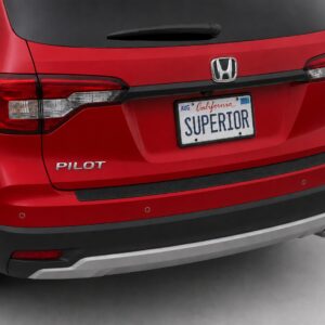 Black vinyl rear sill plate installed on the rear bumper loading edge of a 2023 Honda Pilot.