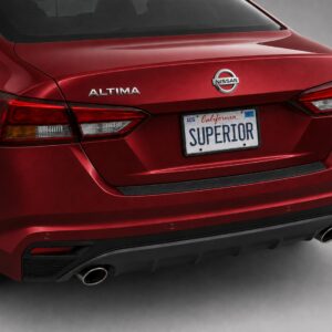Black vinyl rear sill plate installed on the rear bumper loading edge of a 2023 Nissan Altima.